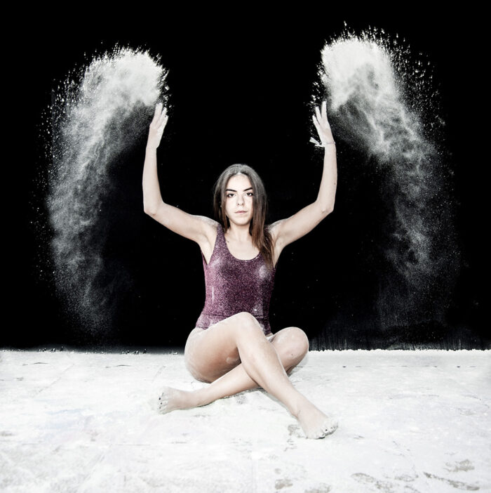 angelwings as an effect of flour explosion portrait by Jenny Liedholm