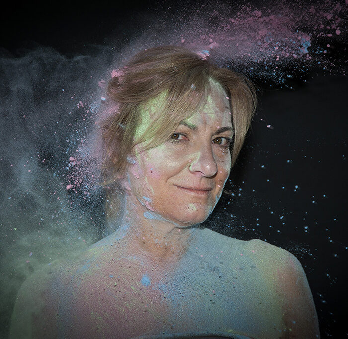 colorful female portrait with flour explosion effects by Jenny Liedholm